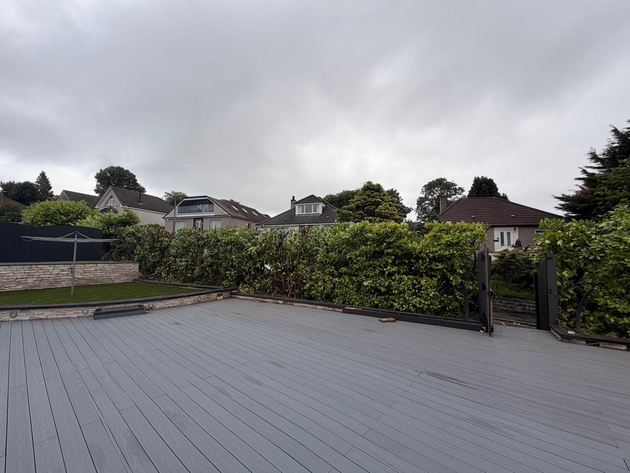 Deck and boundary hedge after HedgeBros hedge reduction work in Clydebank